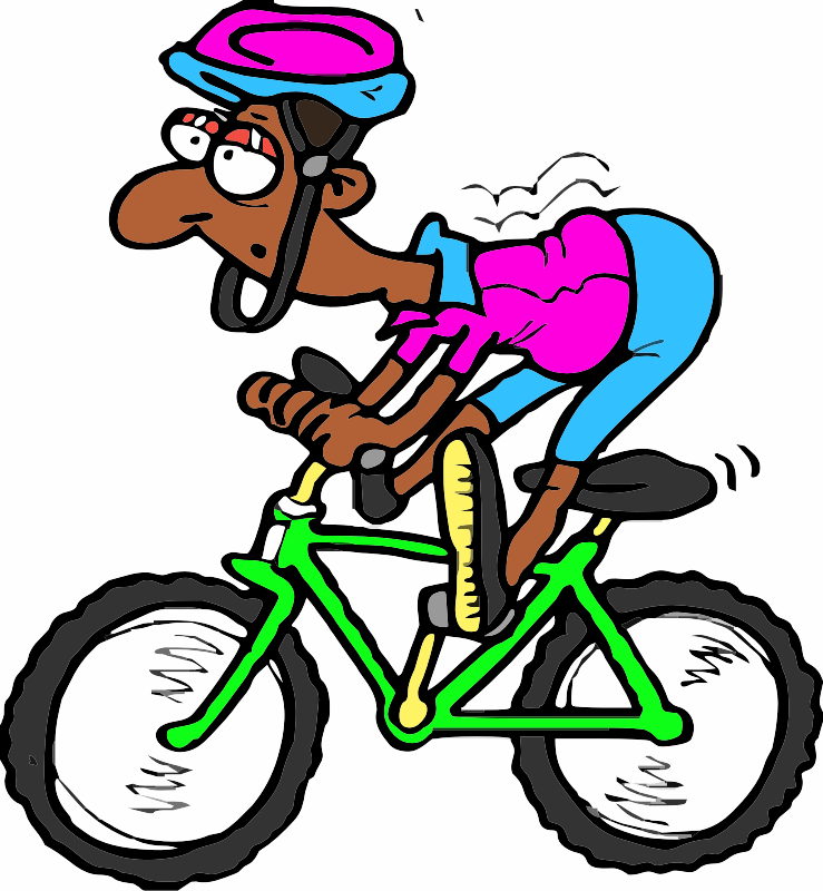 An Indian Man riding a bike
