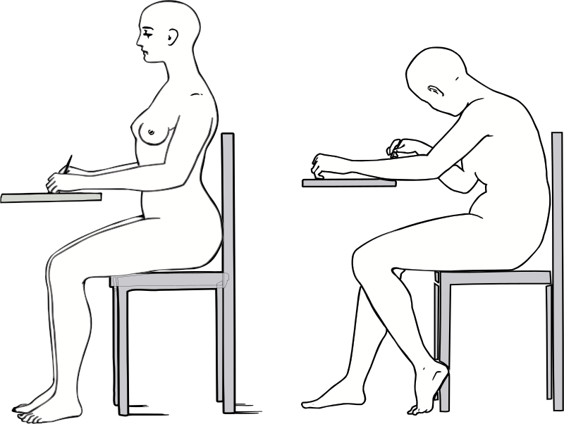 2 women sitting writing exams